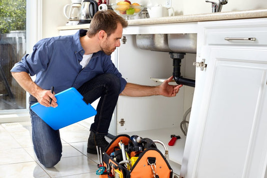How  and why should plumbing professionals encourage customers to use water leak alarms?